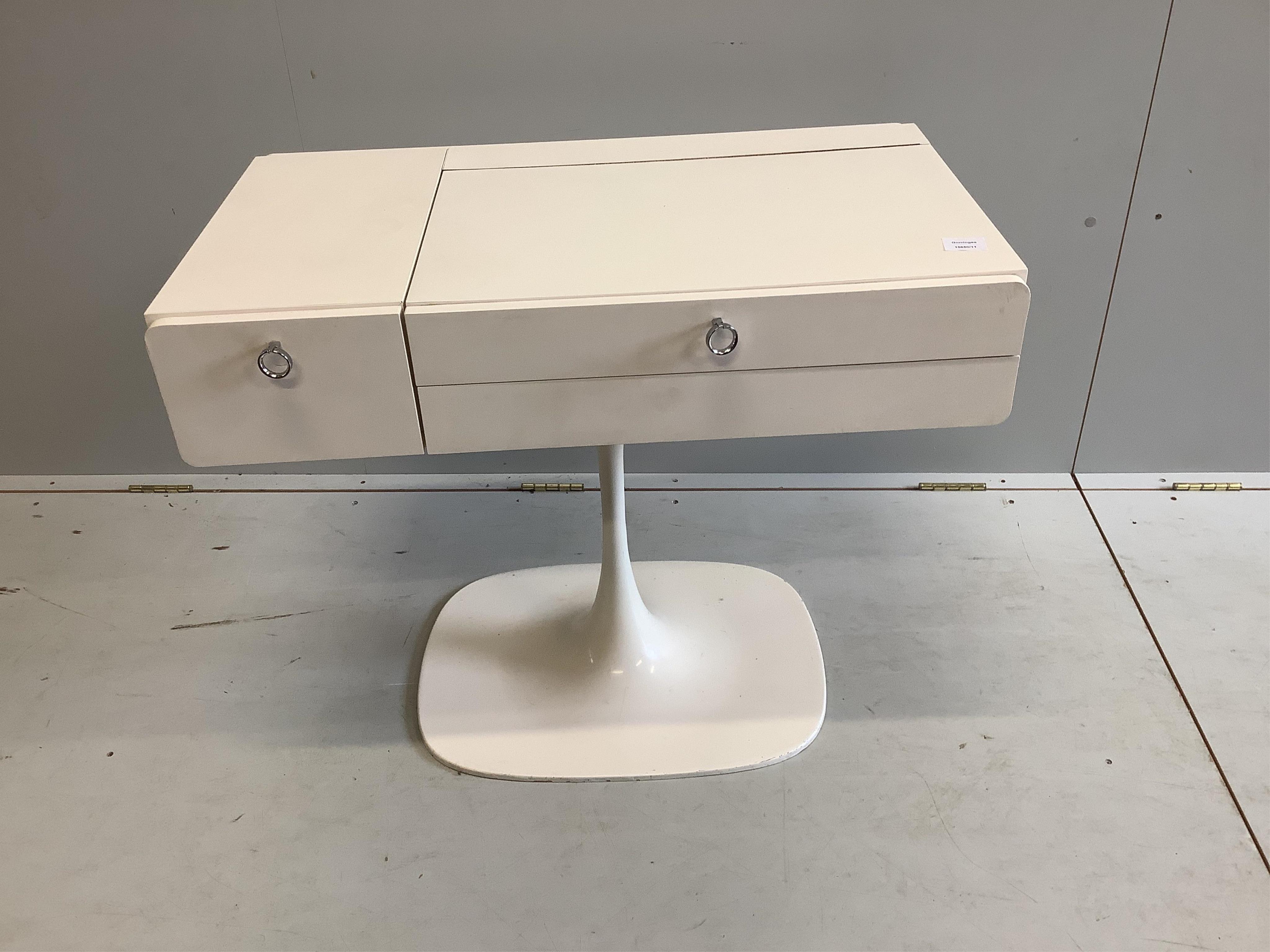 A 1960’s white tulip base dressing table, width 82cm, depth 48cm, height 66cm. Condition - good